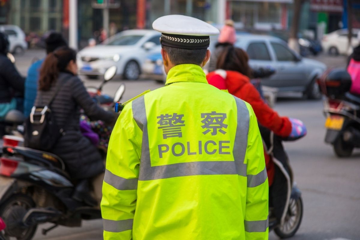 Ilustrasi petugas polisi China.