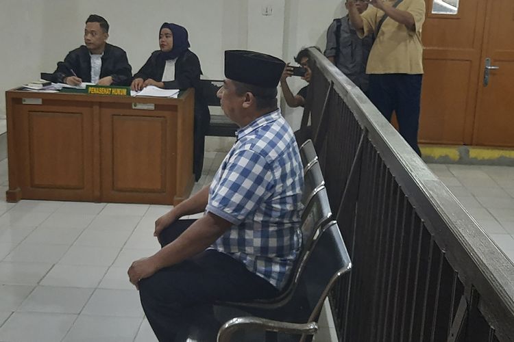 Ipda Vulton Matheos yang menjadi terdakwa kasus penipuan saat menjalani sidang di Pengadilan Negeri Kelas 1 Palembang.