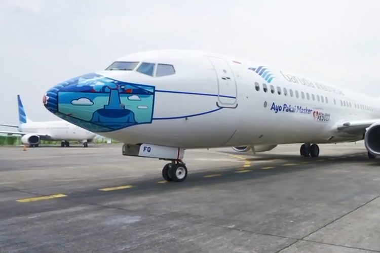 A Garuda Indonesia plane sporting the airlines new mask livery