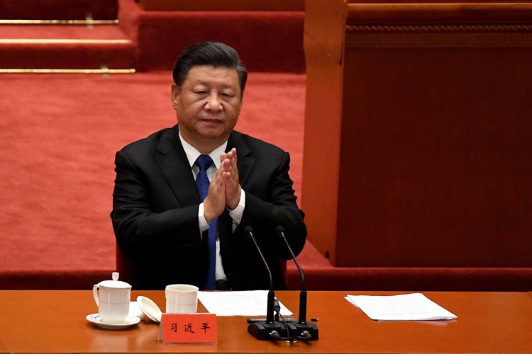 Presiden China Xi Jinping ketika menghadiri peringatan ke-110 Revolusi Xinhai yang menggulingkan Dinasti Qing dan berujung berdirinya Republik China, di Aula Besar Rakyat, Beijing, 9 Oktober 2021.