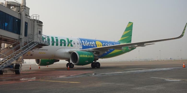 Pesawat Citilink dengan logo tiket.com di Bandara Soekarno-Hatta, Jumat (27/7/2018).  