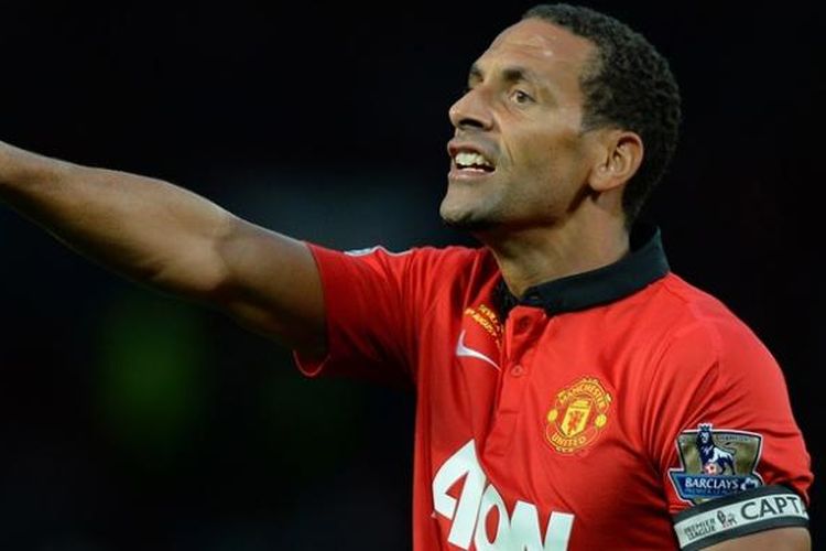 Reaksi Rio Ferdinand saat Manchester United melawan Sevilla dalam laga persahabatan di Old Trafford, Jumat atau Sabtu (10/8/2013). Pertandingan ini sekaligus laga testimonial bagi Ferdinand atas pengabdiannya selama sebelas tahun membela Setan Merah. 