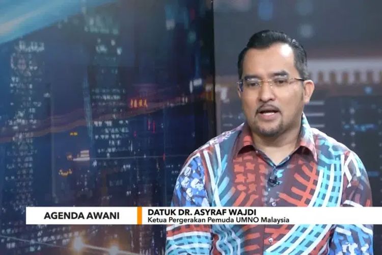 Tangkapan layar wawancara Ketua Pemuda UMNO, Datuk Dr Asyraf Wajdi Dusuki, di stasiun tv Astro AWANI Malaysia.