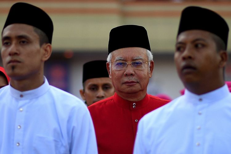 Perdana Menteri Malaysia Najib Razak (tengah) saat kongres tahunan United Malays National Organisation (UMNO) di Kuala Lumpur 7 Desember 2017. 