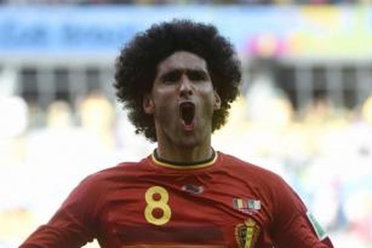 Pemain tengah Belgia Marouane Fellaini dalam laga Grup H, Piala Dunia 2014, melawan Algeria, di Mineirao Stadium, Belo Horizonte, 17 Juni 2014. 