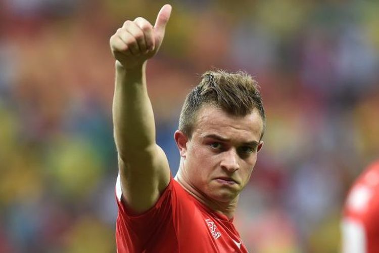 Penyerang sayap Swiss, Xherdan Shaqiri, merayakan kemenangan timnya 3-0 atas Honduras, pada laga terakhir Grup E, di Arena Amazonia, Manaus, Rabu (25/6/2014). Tiga gol Swiss dicetak oleh Shaqiri.