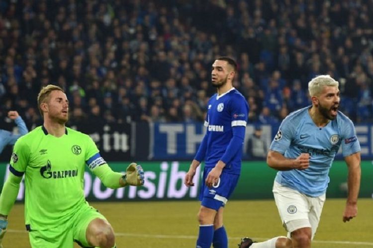 Striker Manchester City Sergio Aguero berselebrasi setelah mencetak gol pada babak 16 besar Liga Champions antara Schalke 04 vs Manchester City pada 20 Februari 2019 di Gelsenkirchen, Jerman.