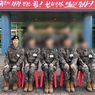 Jin BTS Bagikan Foto Pakai Seragam Militer dan Topi Baret