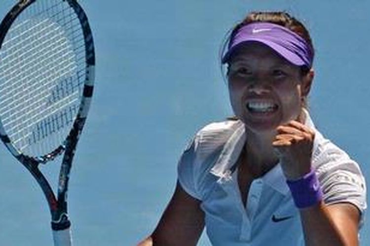 Petenis China Li Na mengekspresikan kegembiraannya setelah mengalahkan Maria Sharapova di semifinal Grand Slam Australia Terbuka 2013.