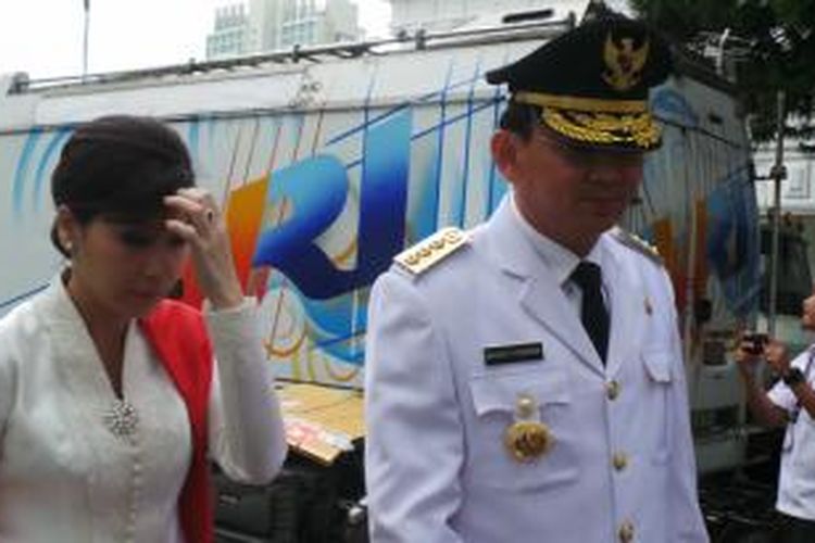 Basuki Tjahaja Purnama dan istrinya Veronica Tan di Istana Negara, Rabu (19/11/2014).