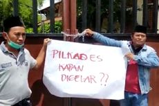 Ratusan Warga Merantai Pagar Rumah Dinas Bupati Pamekasan dan Kantor Dewan, Ini Penyebabnya