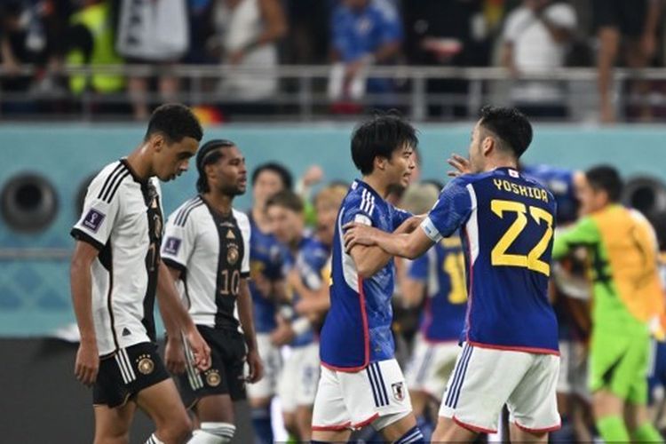 Ekspresi pemain Jerman seusai melihat gawangnya dijebol oleh Jepang dalam matchaday perdana babak penyisihan grup Piala Dunia 2022. (Photo by Philip FONG / AFP)