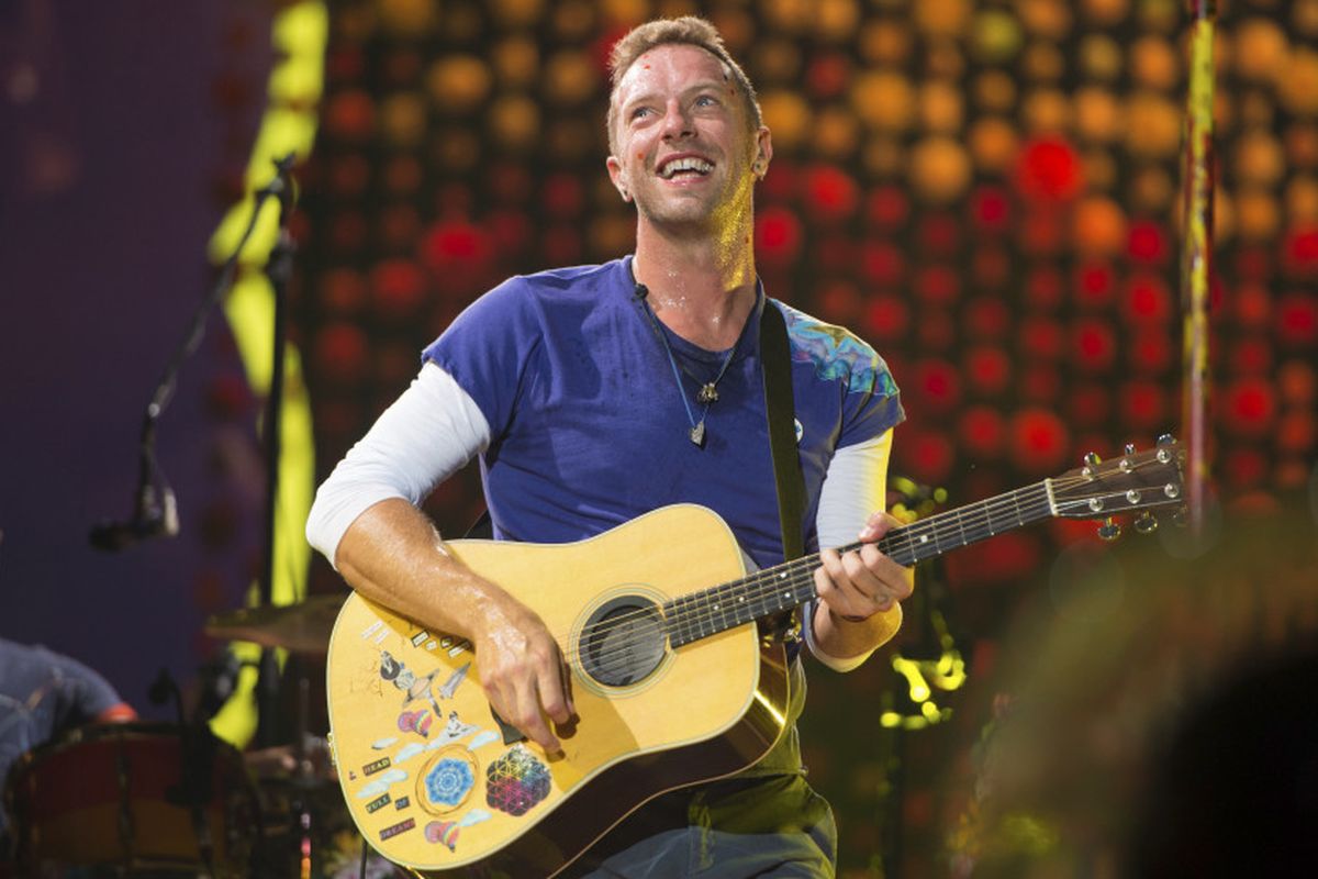 FILE - Chris Martin of Coldplay performs at Metlife Stadium on Aug. 1, 2017, in East Rutherford, N.J.  Coldplay's latest album, ?Music of the Spheres,? releases Oct. 15.  (Photo by Scott Roth/Invision/AP, File)