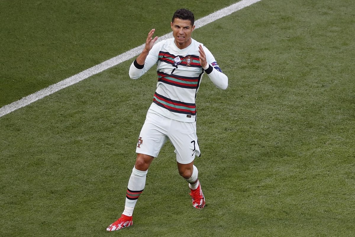 Penyerang Portugal Cristiano Ronaldo setelah gagal memaksimalkan peluang pada laga pembuka Grup F Euro 2020 kontra Hongaria di Stadion Puskas Arena, Budapest, Selasa (14/6/2021) malam WIB.