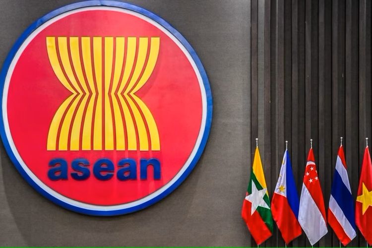 A photo shows ASEAN logo and the national flags of some of its members. 