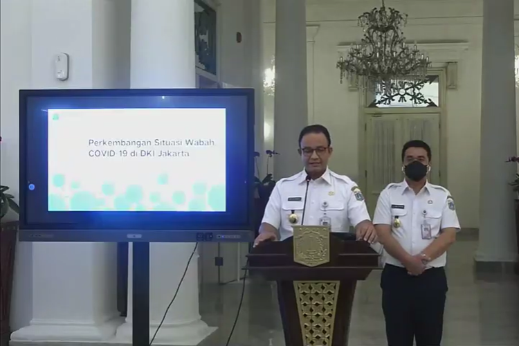 Jakarta Governor Anies Baswedan (left) and his deputy Ahmad Riza Patria announce that Jakarta will re-impose the large-scale social restrictions or partial lockdown from September 14. 