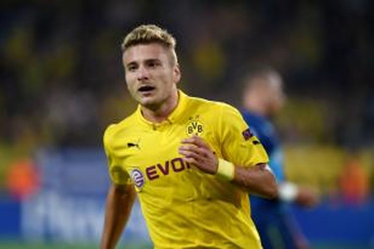 Striker Borussia Dortmund, Ciro Immobile, seusai mencetak gol ke gawang Arsenal pada matchday pertama Grup D Liga Champions di Stadion Signal Iduna Park, Selasa (16/9/2014). 