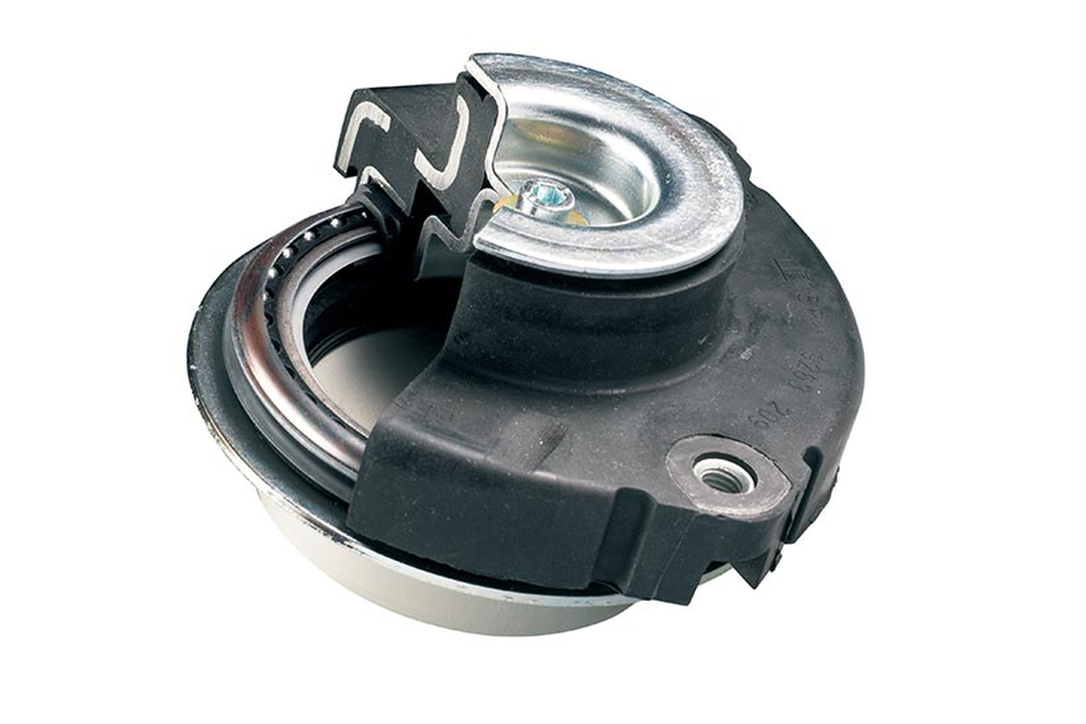Strut Bearing berfungsi memungkinkan strut berotasi dengan lembut saat setir diputar.
