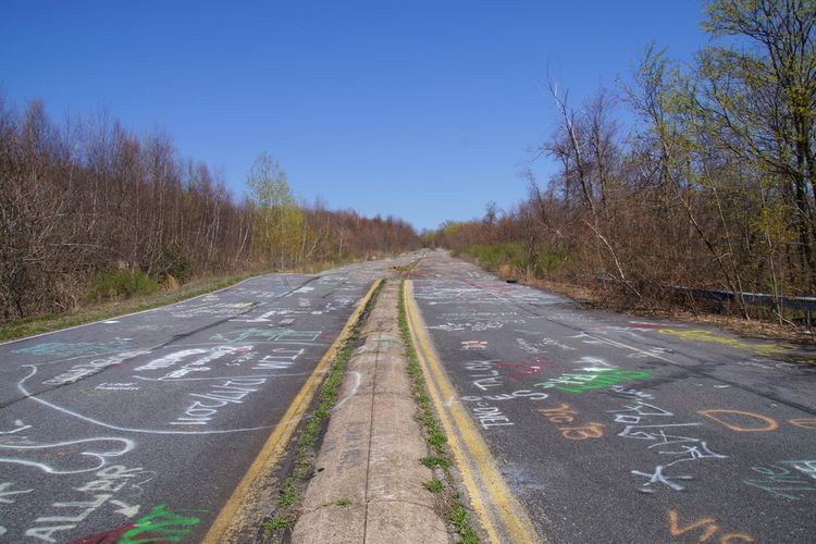 Abandoned highway stained with graffiti, Centralia.