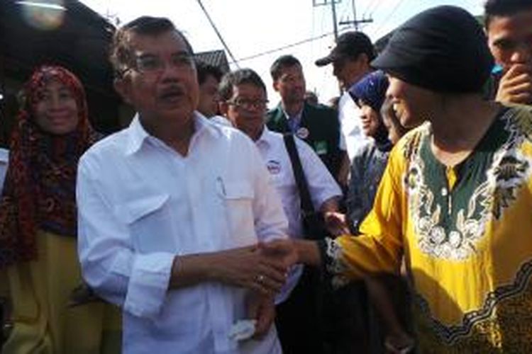 Calon wakil presiden Jusuf Kalla saat berkunjung ke Kota Malang, Jawa Timur, Selasa (17/6/2014).