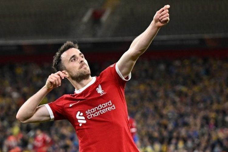 Striker Liverpool, Diogo Jota, berselebrasi setelah mencetak gol kedua dalam lanjutan fase Grup E Liga Europa yang mempertemukan Liverpool vs Union Saint-Gilloise di Stadion Anfield pada 5 Oktober 2023. Artikel ini berisi hasil Liga Europa. (Foto oleh Oli SCARFF / AFP)