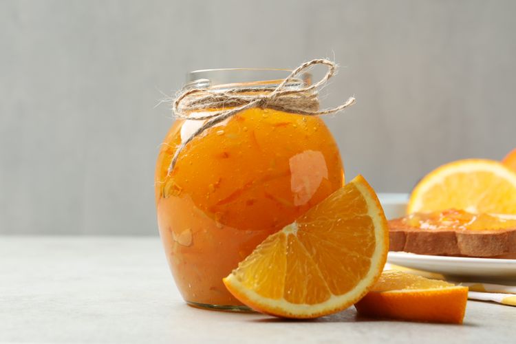 Ilustrasi selai jeruk marmalade. 