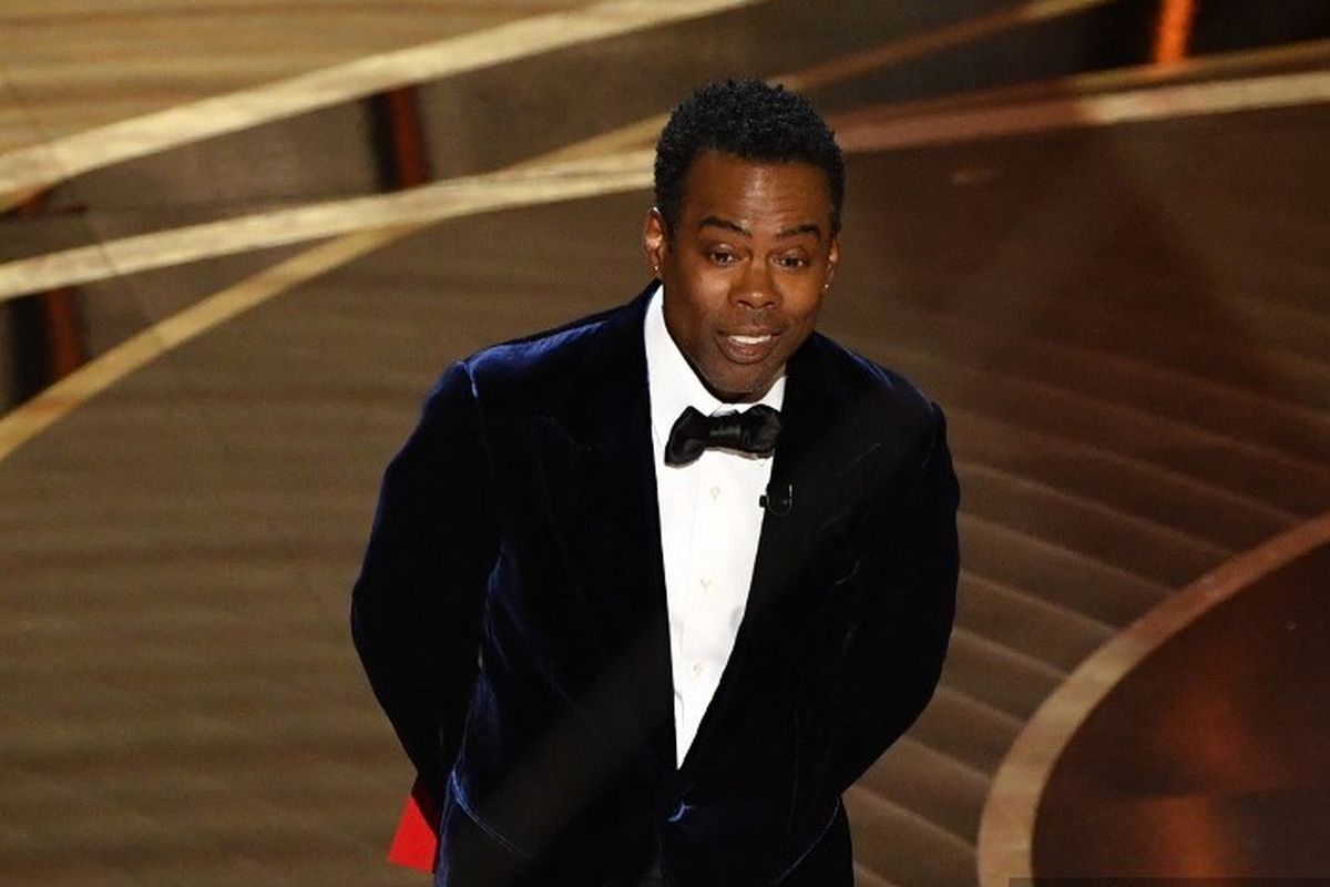 Aktor dan komedian Chris Rock menjadi salah satu presenter di perhelatan Academy Awards atau Oscar 2022 yang digelar di Dolby Theatre di Hollywood, California, Minggu (27/3/2022).