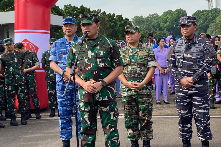 TNI Commander Admiral Yudo Margono (front) speaks during an event at TNI headquarters in Cilangkap, East Jakarta on Thursday, April 13, 2023. He is accompanied by the chief of staff of the three military branches.