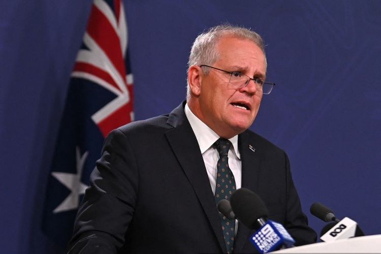 Perdana Menteri Australia Scott Morrison berbicara kepada media untuk mengumumkan sanksi terhadap pejabat tinggi Rusia setelah invasi ke Ukraina timur, selama konferensi pers di Sydney pada 23 Februari 2022.