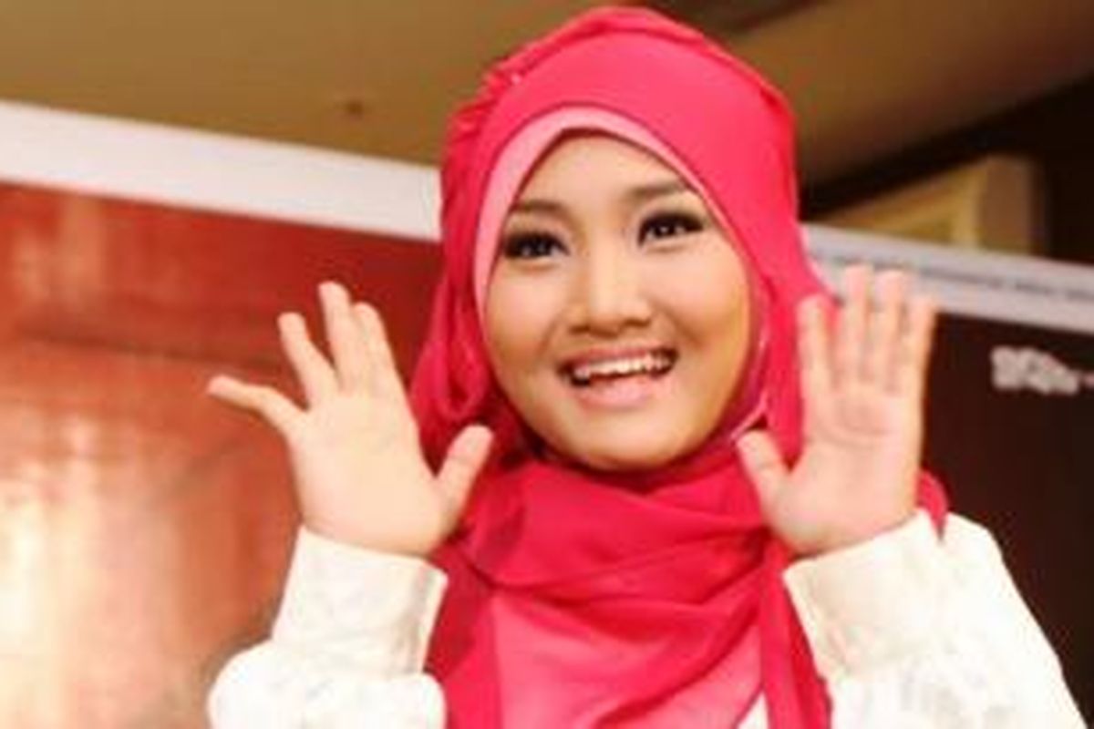 Pemenang X Factor Indonesia, Fatin Shidqia Lubis atau Fatin saat menghadiri konferensi pers 'X Factor Around The World' di Hall D2 JIExpo, Kemayoran, Jakarta Pusat, Jumat (23/8/2013). 