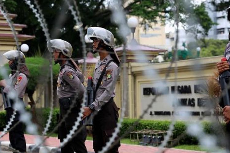 Police personnel at the National Police Headquarters in Jakarta. 