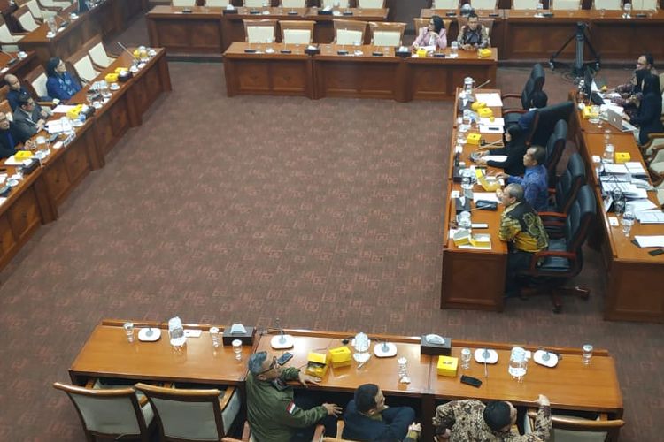 Indonesia's House of Representatives Commission I, which oversees security and foreign affairs, holds a meeting at the Parliament building in Jakarta on February 25, 2020. 