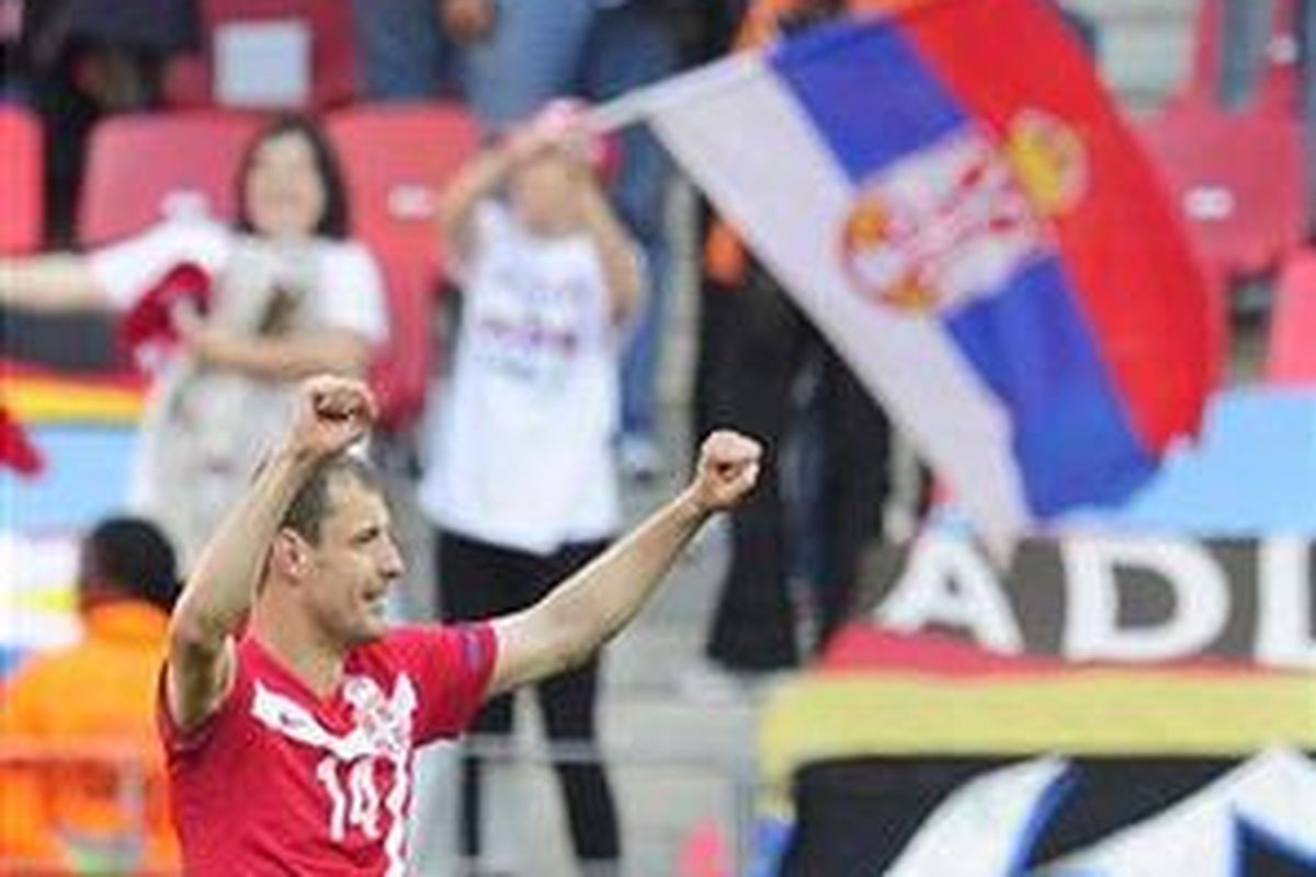 Gelandang Serbia, Milan Jovanovic meluapkan kegembiraannya usai mencetak gol ke gawang Jerman pada penyisihan grup Piala Dunia 2010, Jumat (18/6/2010).