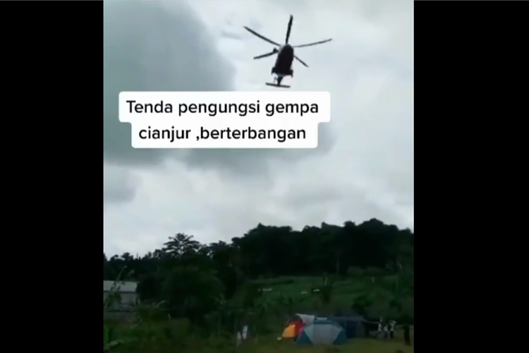Tangkapan layar unggahan video yang memperlihatkan helikopter memporak-porandakan tenda pengungsi korban gempa di Cianjur.