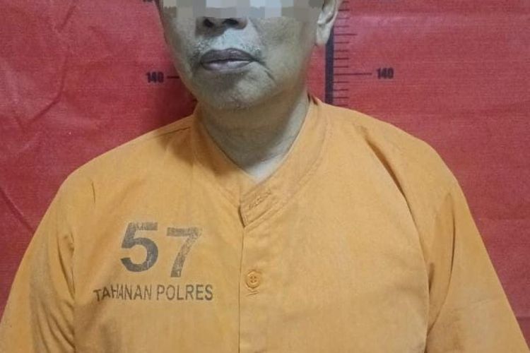 Pelaku Jufri saat diamankan Polres Sumenep. 