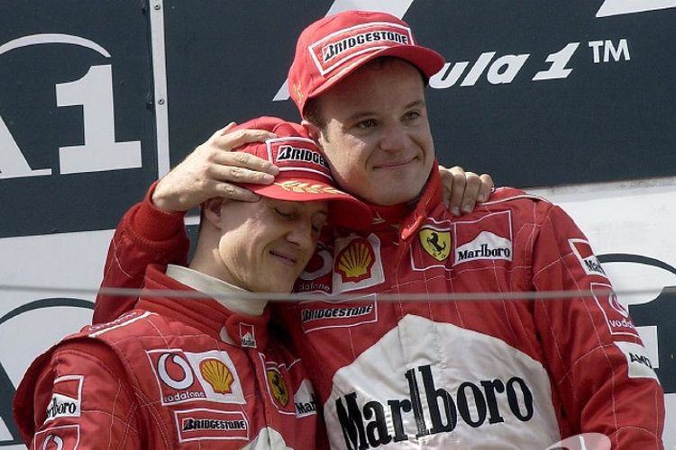 Rubens Barrichello (kanan) dan Michael Schumacher (kiri)
