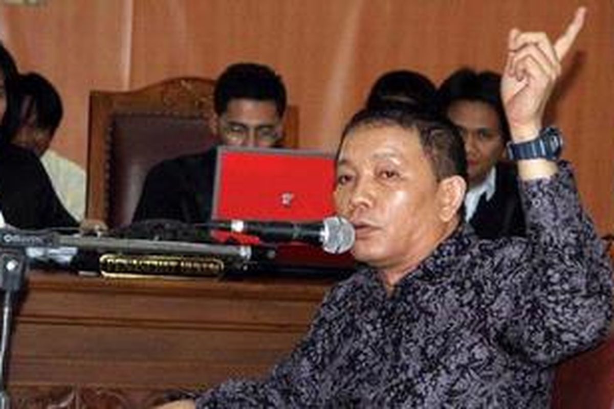 Haposan Hutagalong saat memberi kesaksian di Pengadilan Negeri Jakarta Selatan, Rabu (18/8/2010).