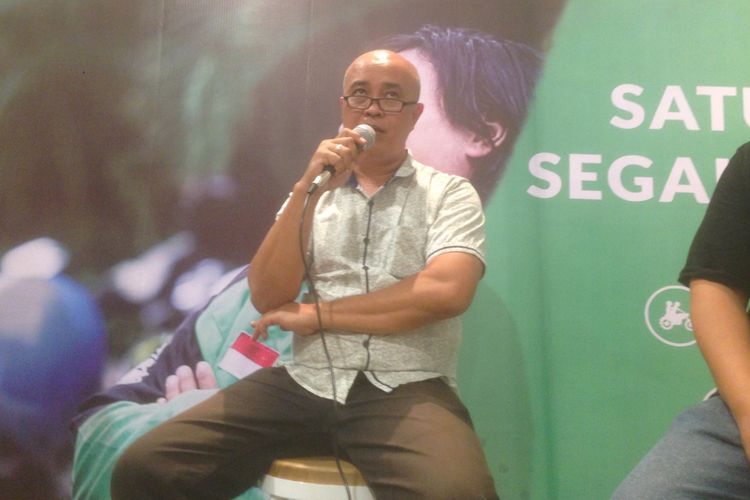 Imam Suachadij, driver online yang membantu penumpang melahirkan di dalam mobilnya. Ia membagikan kisah itu bersama Sandi Eko Prasetyo (suami penumpang yang melahirkan) di acara Gojek, di Warung Penang Semarang, Rabu (20/2/2019)