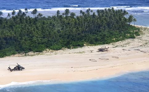 A Lifesaving SOS Sign for Three Rescued Men Stuck on Pacific Island