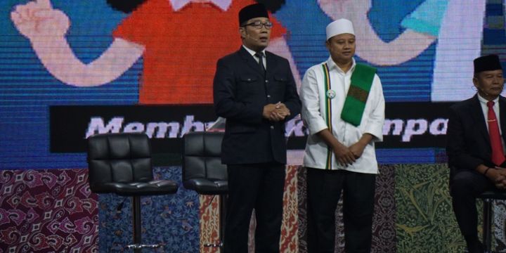 Pasangan calon Ridwan Kamil-Uu Ruzhanul Ulum dalam debat publik Pilgub Jabar terakhir, Jumat (22/6/2018).