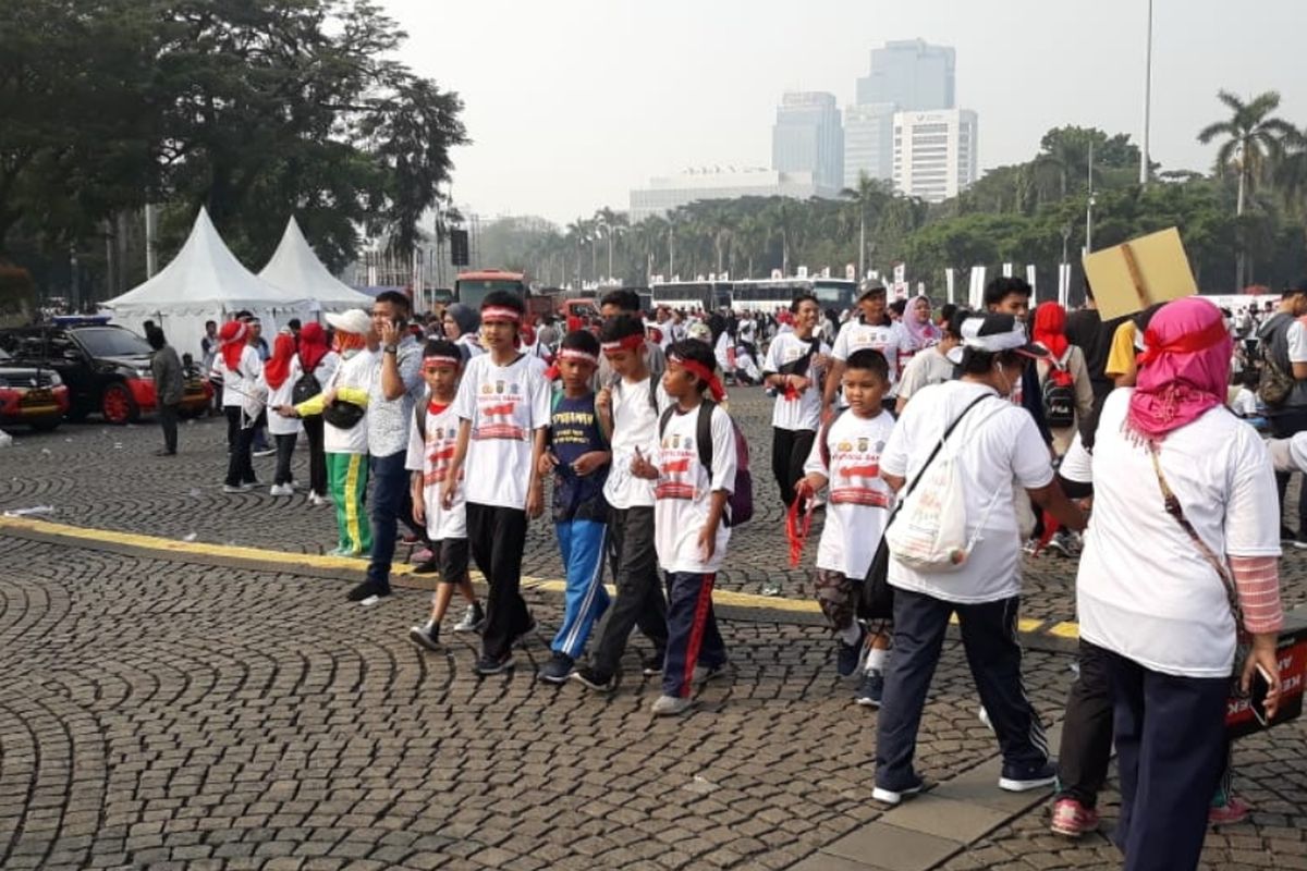 Suasana keramaian warga Ibu kota di Festival Damai yang digelar Polda Metro Jaya di Kawasan Monas, Jakarta Pusat, Minggu (23/6/2019).