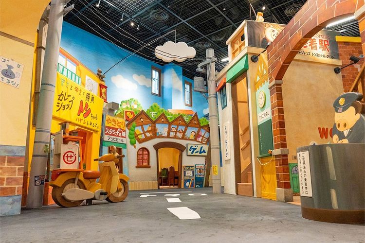 Ilustrasi Children's Town di kawasan Ghibli's Grand Warehouse di Ghibli Park, Jepang.
