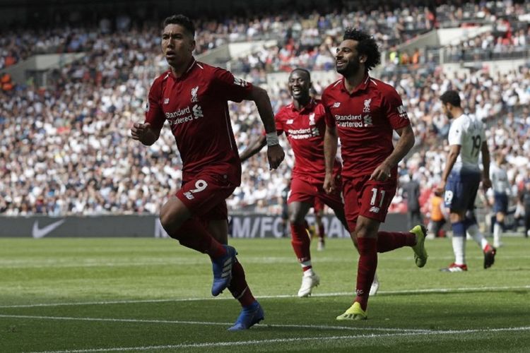 Roberto Firmino, Mohamed Salah, dan Naby Keita merayakan gol Liverpool ke gawang Tottenham Hotspur pada pertandingan di Stadion Wembley, 15 September 2018. 