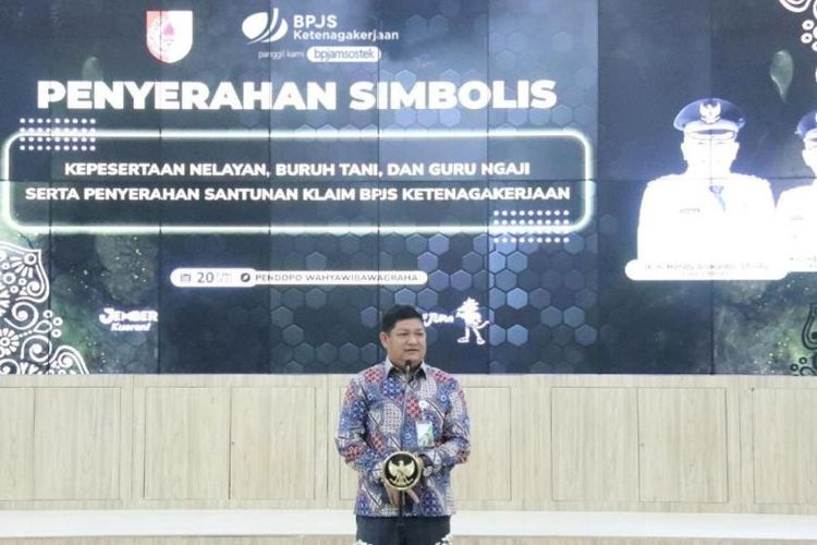 Direktur Kepesertaan BPJAMSOSTEK Zainudin saat memberikan sambutan.