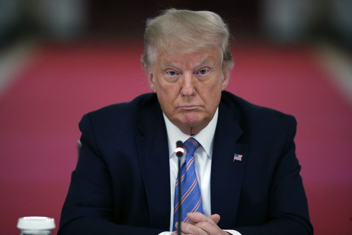 Foto tanggal 7 Juli 2020 memperlihatkan Donald Trump ketika masih menjabat Presiden Amerika Serikat, menyimak acara National Dialogue on Safely Reopening America's Schools di East Room, Gedung Putih, Washington DC.