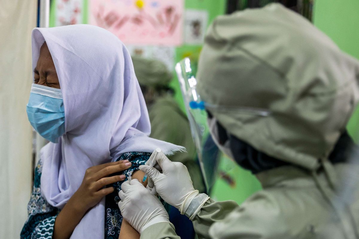 A student receives a dose of Covid-19 vaccine in Jakarta, Thursday, July 1, 2021. 