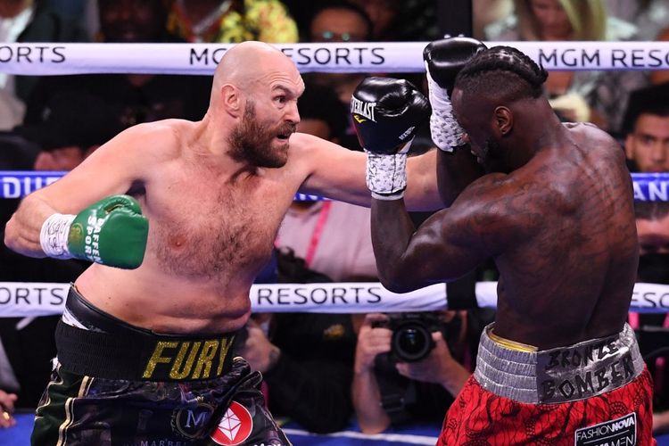 Duel trilogi Tyson Fury vs Deontay Wilder yang berlangsung di T-Mobile Arena, Nevada, Amerika Serikat, Minggu (10/10/2021) pagi WIB. 