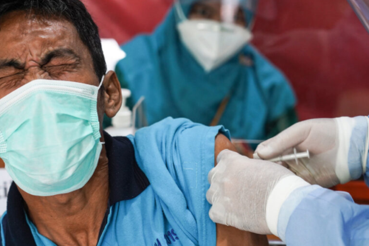 A patient of the Marzoeki Mahdi Hospital in Bogor, West Java receives a dose of the Covid-19 vaccine on Tuesday, June 1, 2021. 