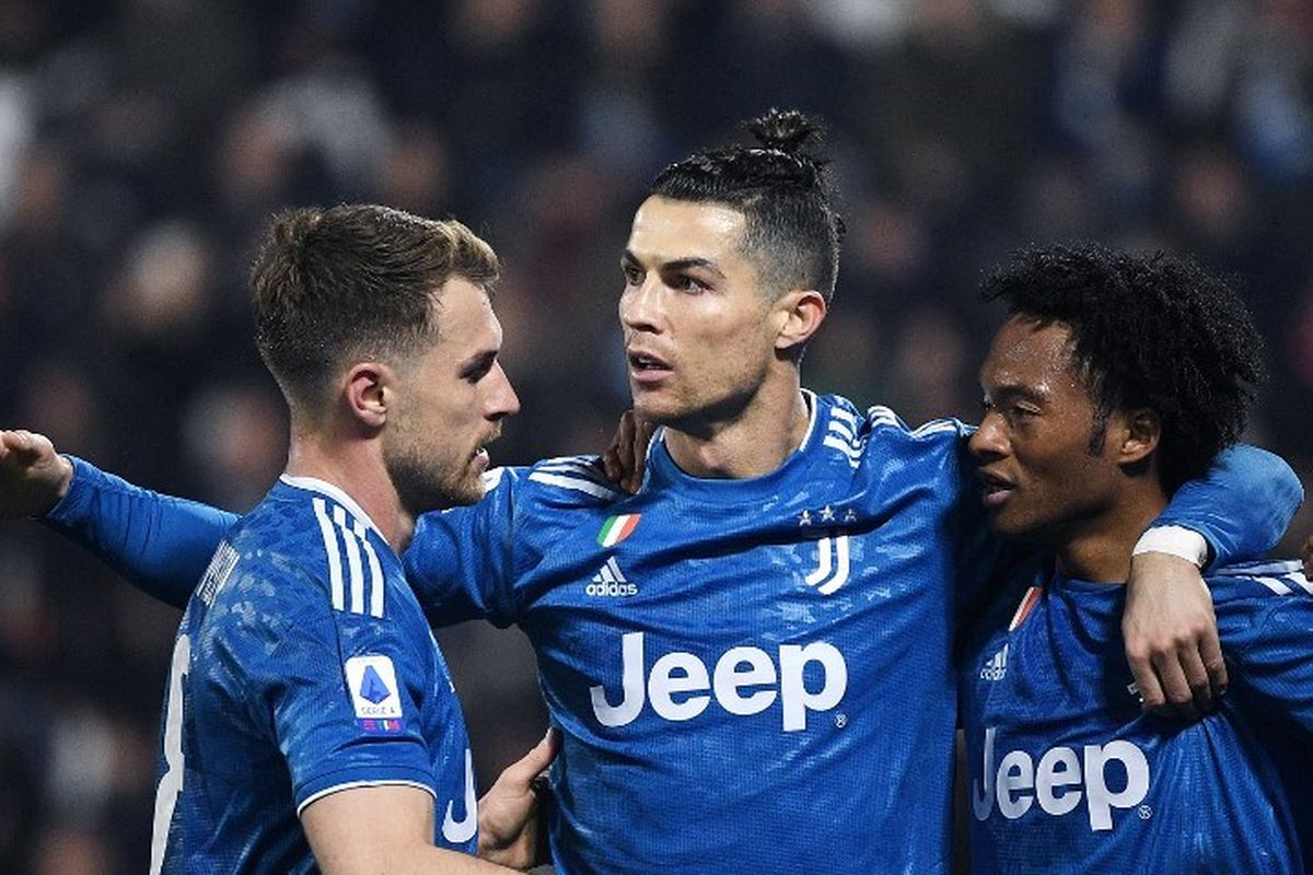 Penyerang Juventus, Cristiano Ronaldo, berselebrasi usai mencetak gol dalam pertandingan Liga Italia antara SPAL vs Juventus pada Sabtu (22/2/2020).