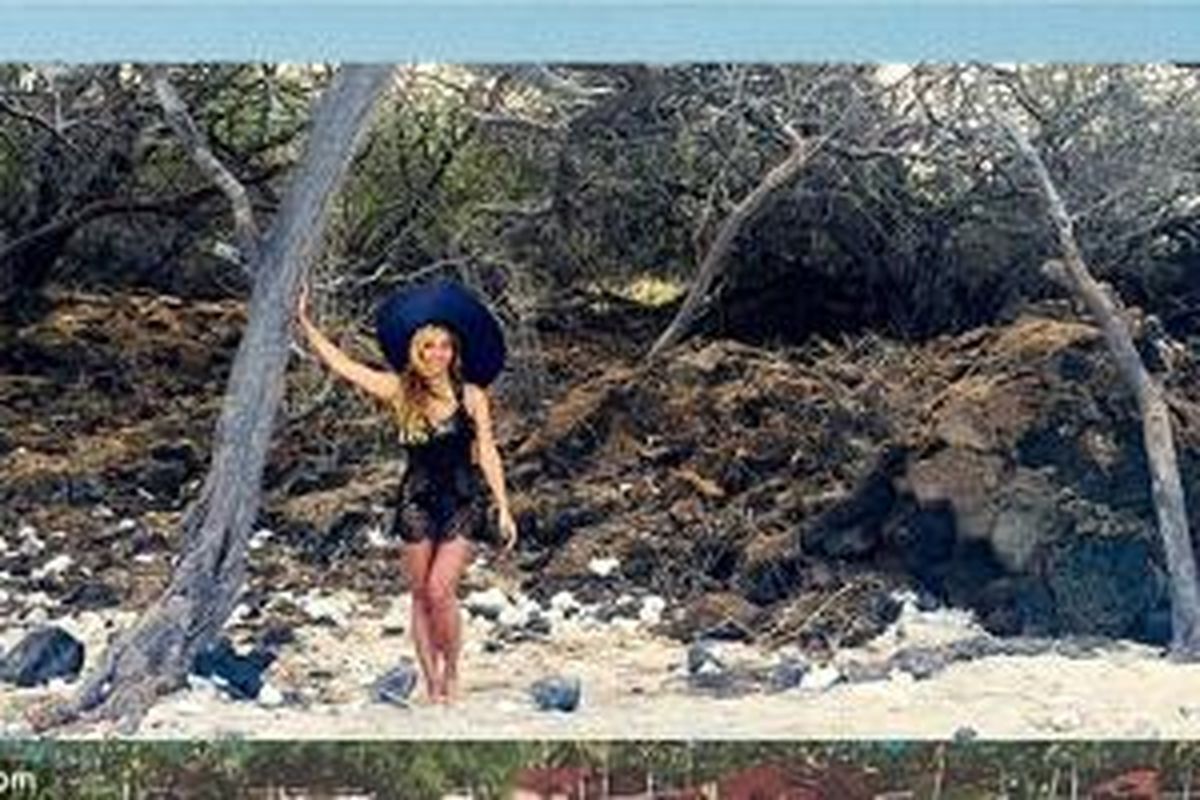 Beyonce mengunggah foto-foto saat merayakan kebahagiaanya di Hawaii dengan sang suami, lewat situs pribadinya, www.beyonce.com. 